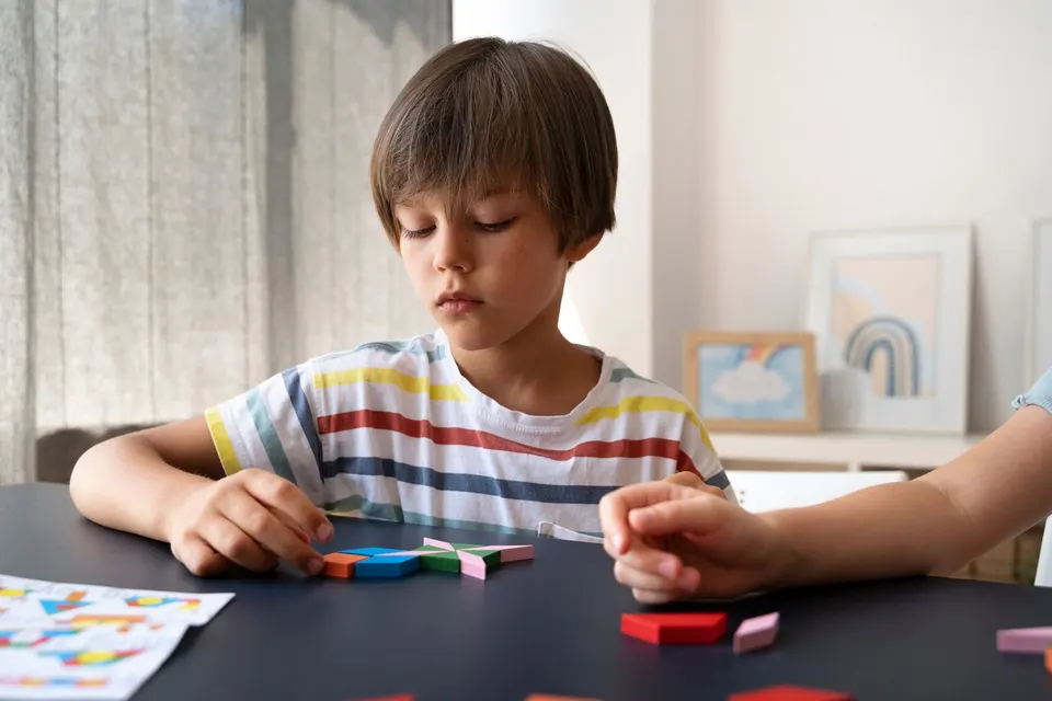 Child engaged in play-based autism support
