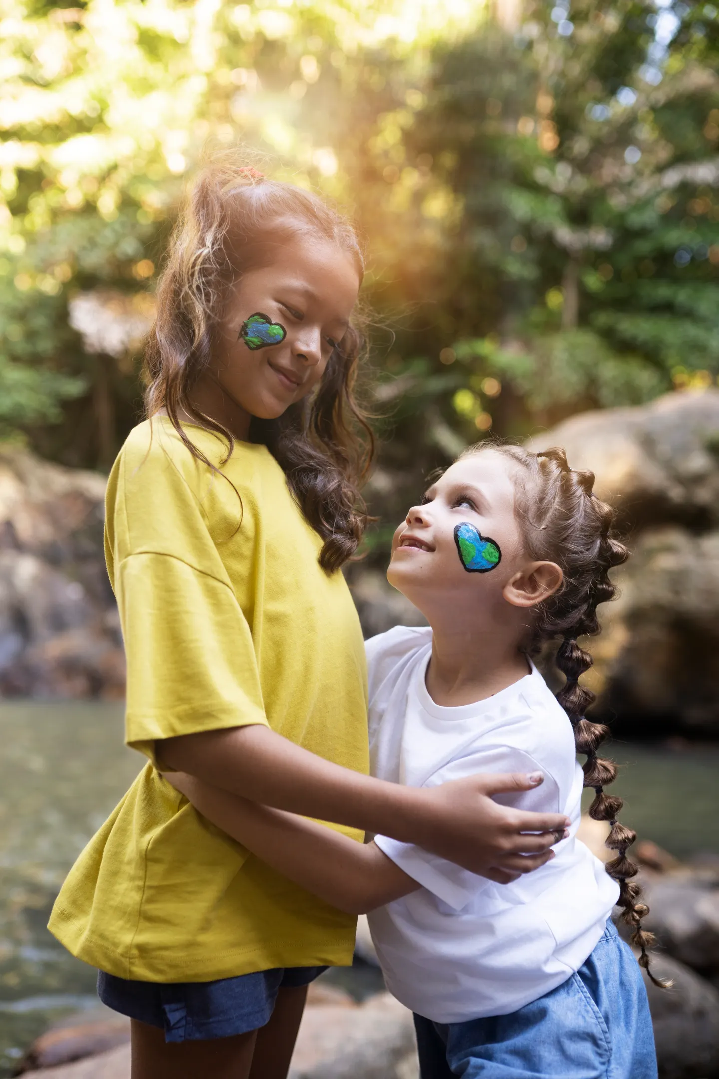 Portrait of two children outdoors